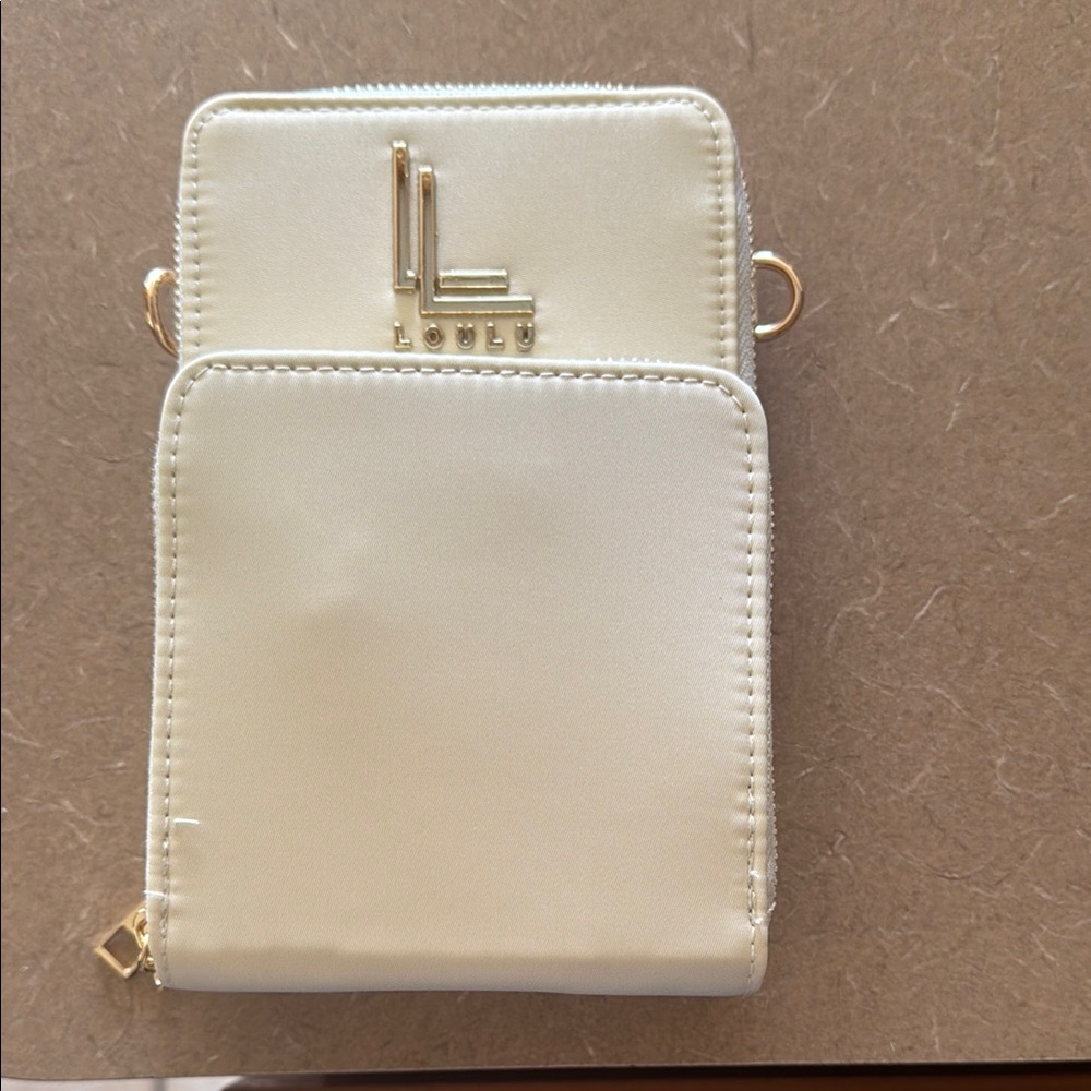 Cream Mini Crossbody Bag. Perfect for travel or on the go! Brand new never used